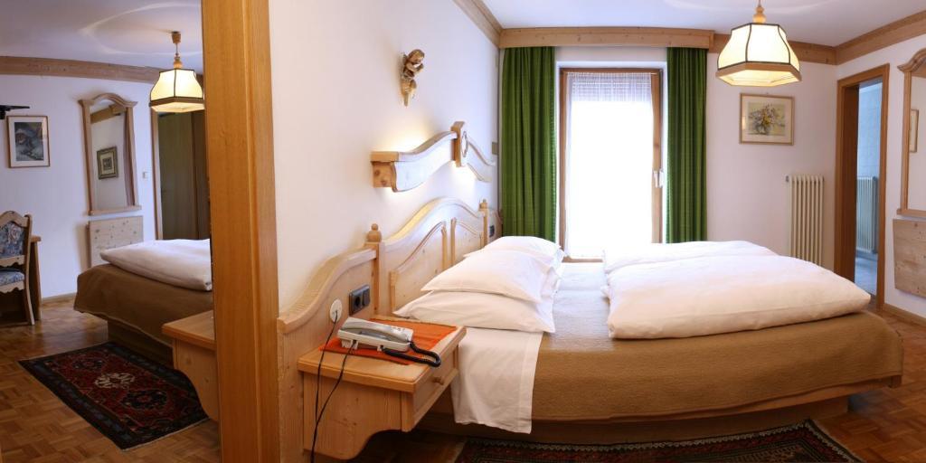 Hotel Dolomiti Madonna Ortisei Værelse billede